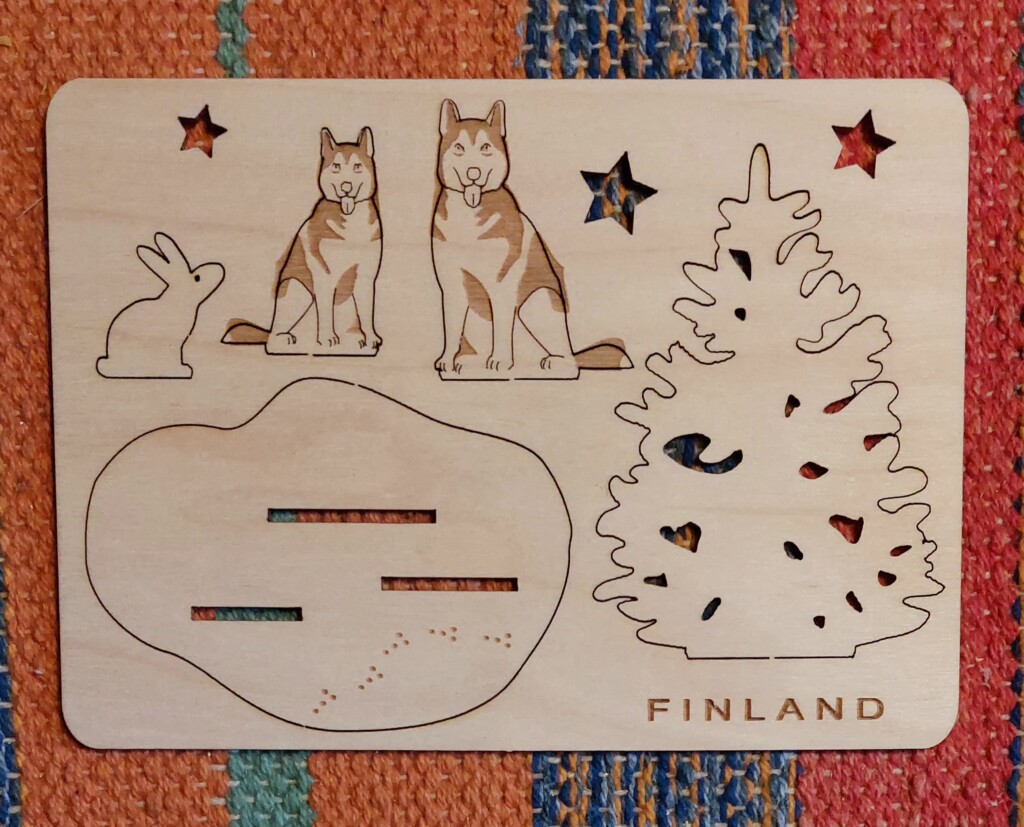 Huskyt kuusi ja pupu koottava kortti